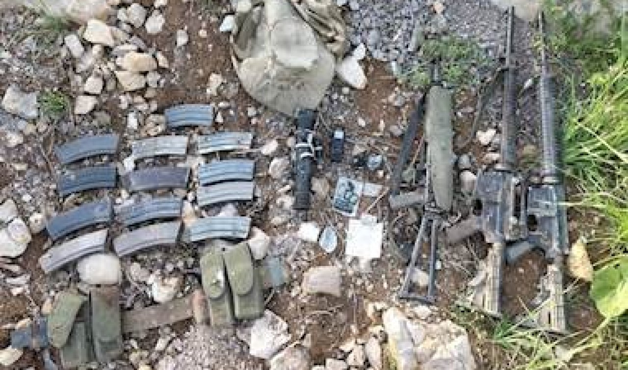 Pençe-Kilit bölgesinde teröristlere ait silah ve mühimmat ele geçirildi