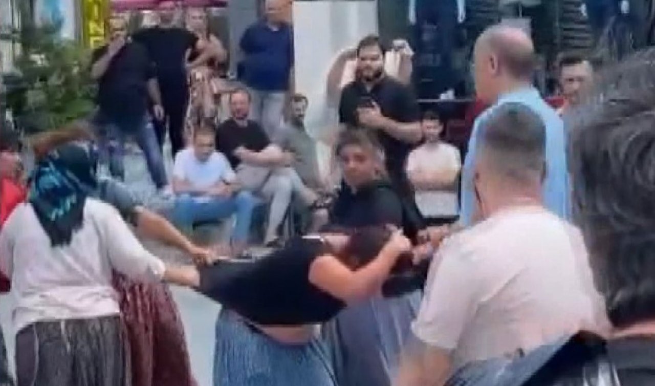 Hırsızlık şüphelisi kadını meydanda saçından tutarak darp etti  