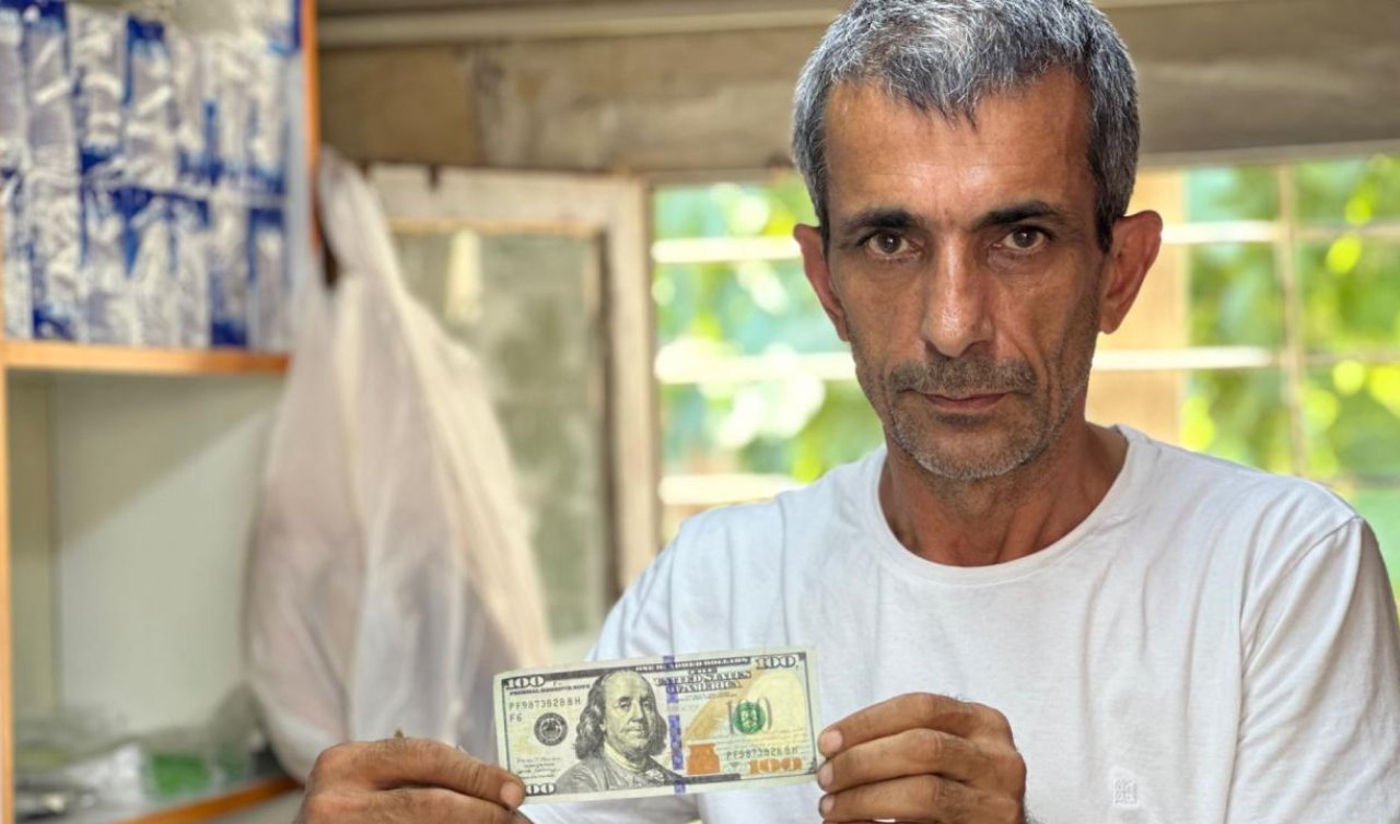Sahte 100 dolarla alışveriş yaptı: Hem ürünleri hem para üstünü aldı