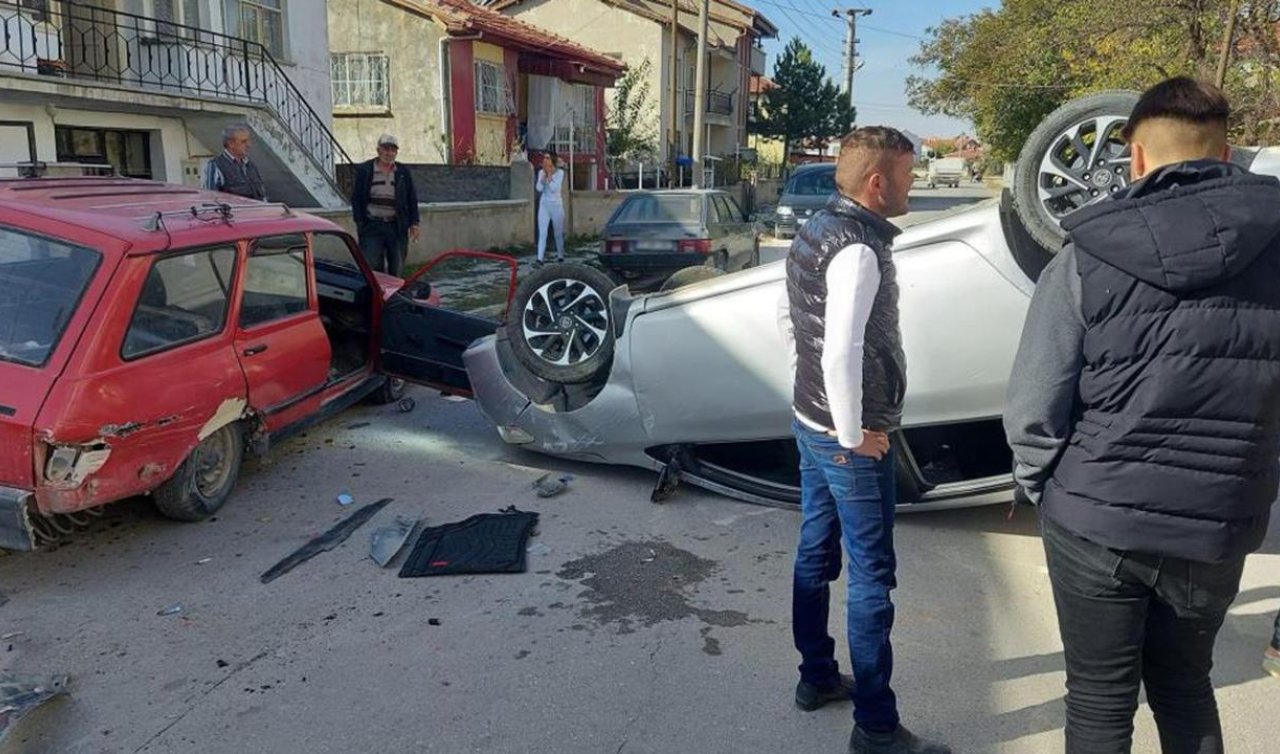 Park halindeki araca çarpan otomobil ters döndü
