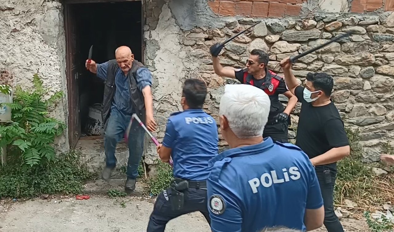  Çöp evini temizletmeyip polisi bıçakladı! 