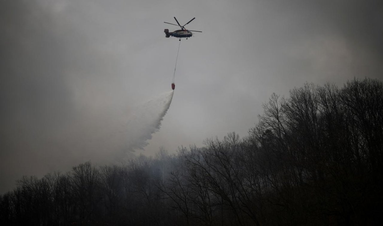 Orman yangınına müdahale sırasında düşen helikopterin pilotu öldü