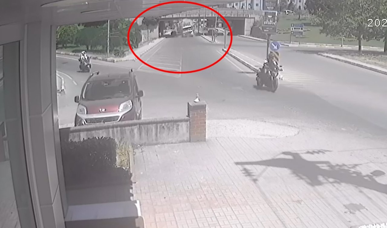 Vinç yüklü TIR alt geçitte sıkıştı; kaza kamerada