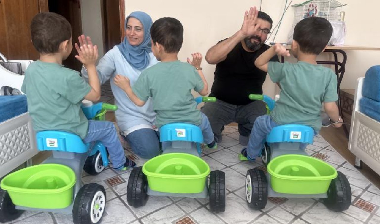 Koruyucu ailesi oldukları üçüzlerle evlerini şenlendirdiler