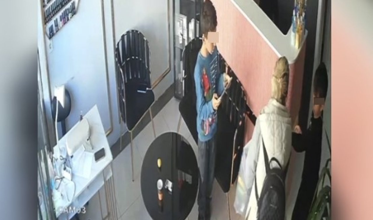 Hırsızlık yapan kadın kendisini uyaran çocukları itip kaçtı