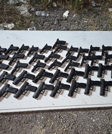 Toprağa gömülü kompresör tankında 20 silah ele geçirildi